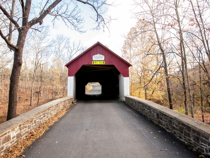 The Frankenfield Covered Bridge was built in 1872 and ​crosses the Tinicum Creek.