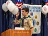 Andrew Galligan reciting the Eagle Scout oath.