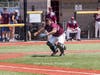 Joe Infante pounces on the bunt for an out.