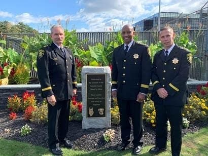 The monument was created from granite used to build the old Riverhead jail 80 years ago.