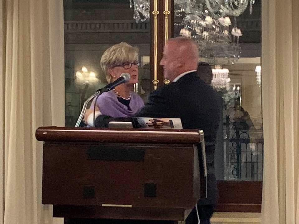 Rich Freeborn receiving his award from Patti McDonald. / Lisa Finn