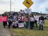 Animal advocates held a silent ceremony Saturday outside Miloski's Poultry Farm on Middle Country Road in Calverton.