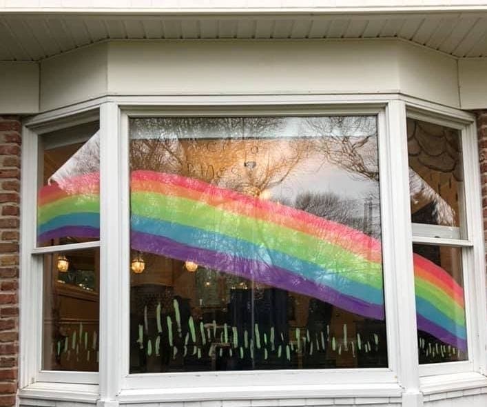 Debbie Horton, whose husband is in ICU with coronavirus, believes after every storm, comes a rainbow, and she painted one in her front window.