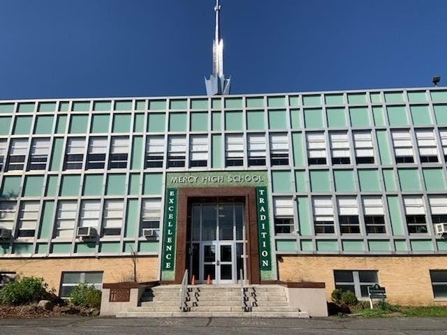 The McGann-Mercy High School property has been purchased by Peconic Bay Medical Center.