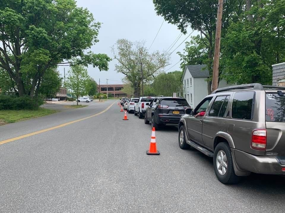 Residents waited for hours for the chance to purchase a beach parking sticker Saturday in Southold.