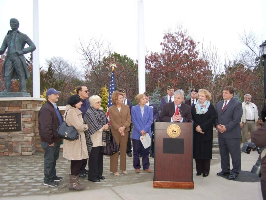 Officials and community members gathered at the dedication of the William Floyd statue in Mastic in 2013.