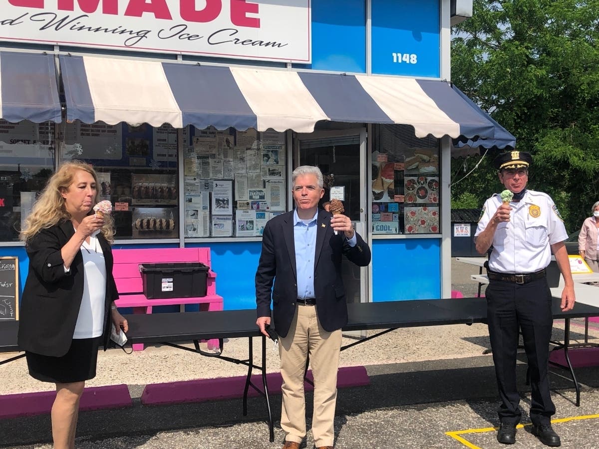 County Executive Steve Bellone stopped at downtown businesses across Suffolk Wednesday, welcoming owners back on the first day of the state's Phase 2 reopening plan.