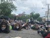 Protesters lay down in the street in Sag Harbor, hands behind their backs, to protest the death of George Floyd.