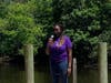 Tia Fulford speaking at a "Mothers in Solidarity" rally, with an eye toward discussing the issues with law enforcement.