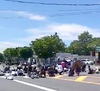 The traffic circle near Peconic Bay Medical Center in Riverhead was closed to traffic for almost nine minutes Saturday as protesters lay on the ground and knelt in memory of George Floyd.