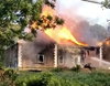 Fire ripped through a former North Fork schoolhouse Sunday.