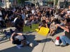 A crowd of protesters knelt and lay down on Montauk Highway in Hampton Bays Sunday to cry out for change after the death of George Floyd.