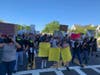 Three young boys held signs that read, "Hampton Bays Supports Black Lives Matter"