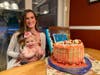 Ruby June Cotter was all smiles as she posed with her mother Ashley at her first birthday party.