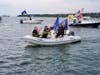 Supporters of Donald Trump in all types of vessels from sailboats to yachts took part in a boat parade Friday.arade 