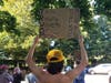 The protest was organized as Donald Trump held a series of fundraisers in the Hamptons.