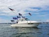 Under blue skies, supporters of President Donald Trump and the police participated in a boat parade.