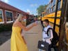 Students arriving at Cutchogue East Elementary were given temperature checks after getting off the buses.
