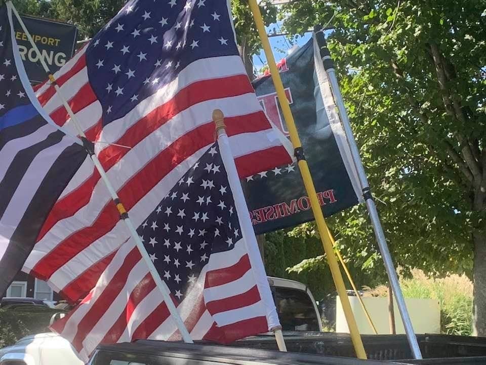 Theodore Schroeder, 60, was arrested and charged with disorderly conduct after he refused to stop blocking a pro-Trump parade, police said.