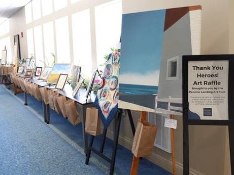 Peconic Landing members are giving back to the heroes who dedicated themselves to caring for them.