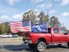 Trump flags flew under blue skies Sunday at a fourth parade organized by Shawn Farash.