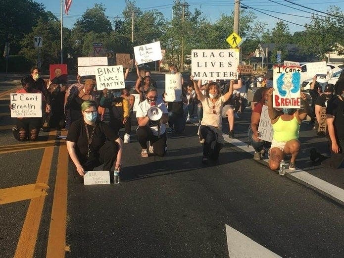 An earlier protest organized against police brutality was held on Rt. 58 in Riverhead in June.