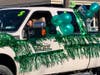 Green balloons and streamers were used to decorate all the vehicles in a parade for a teen battling cancer.