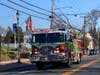 Firetrucks and police led a parade to support Dylan Newman of Southold.