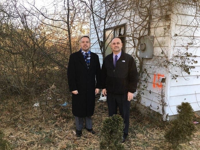 Suffolk County Legislator Rudy Sunderman (right) and Brookhaven Town Councilman at a zombie house.