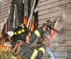  Ex-captain Tom Glover opening up an exterior wall.