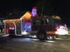 Santa waved to kids at the parade.