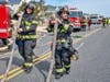 Firefighters rushed to a Dune Road home on Friday.