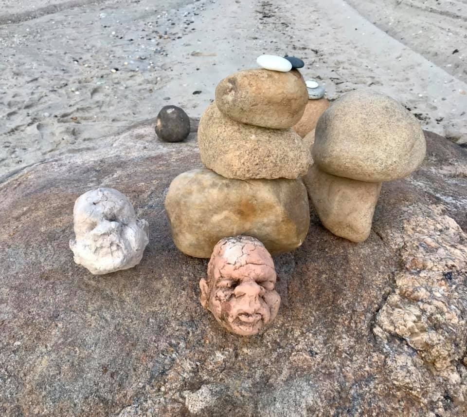Creepy discovery or an artist's display by the surf? Curious minds want to know.