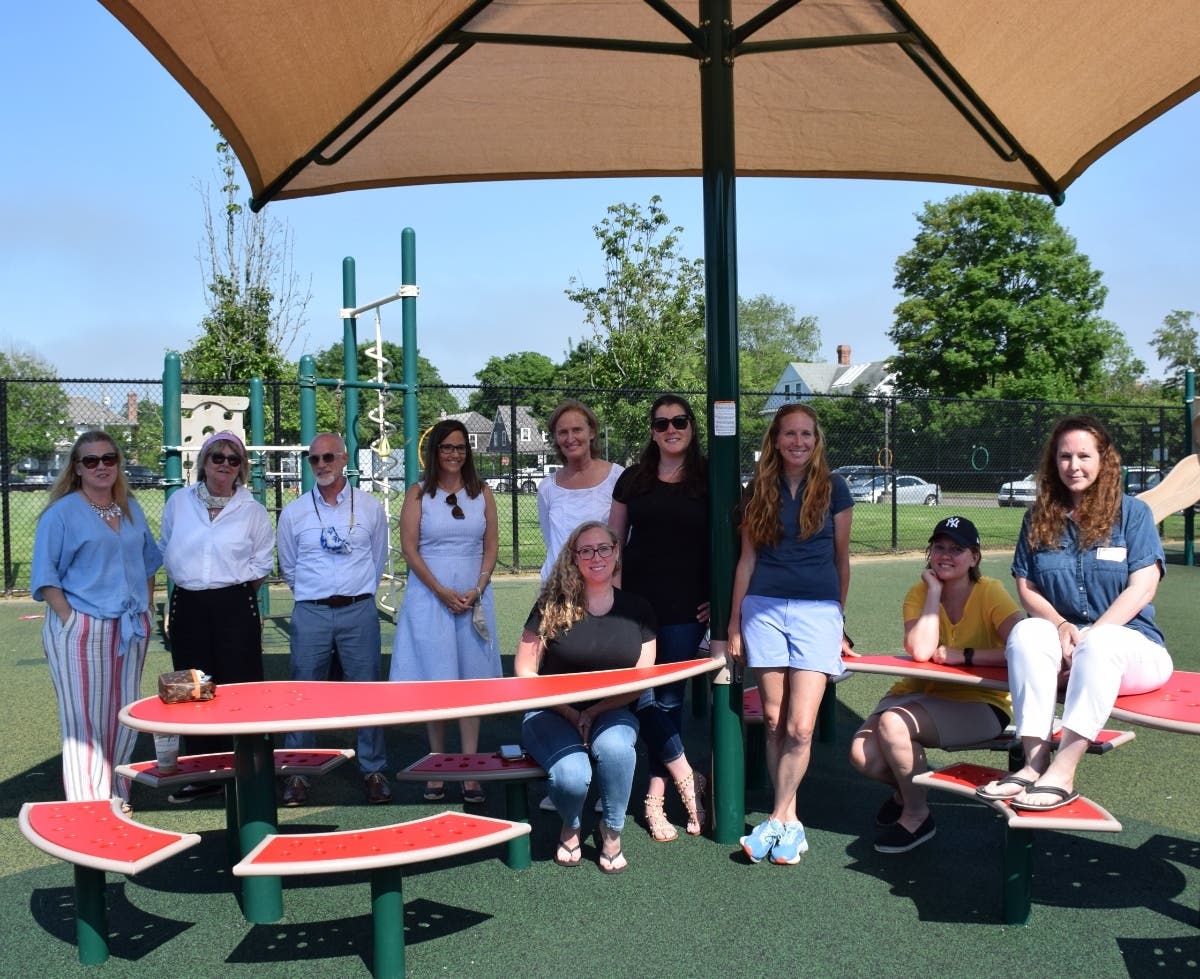 A teacher was remembered for her love of reading at a dedication of playground equipment in her honor.