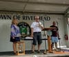 Jay Schneiderman took home the trophy in an annual race between Southampton and Riverhead Town supervisors.