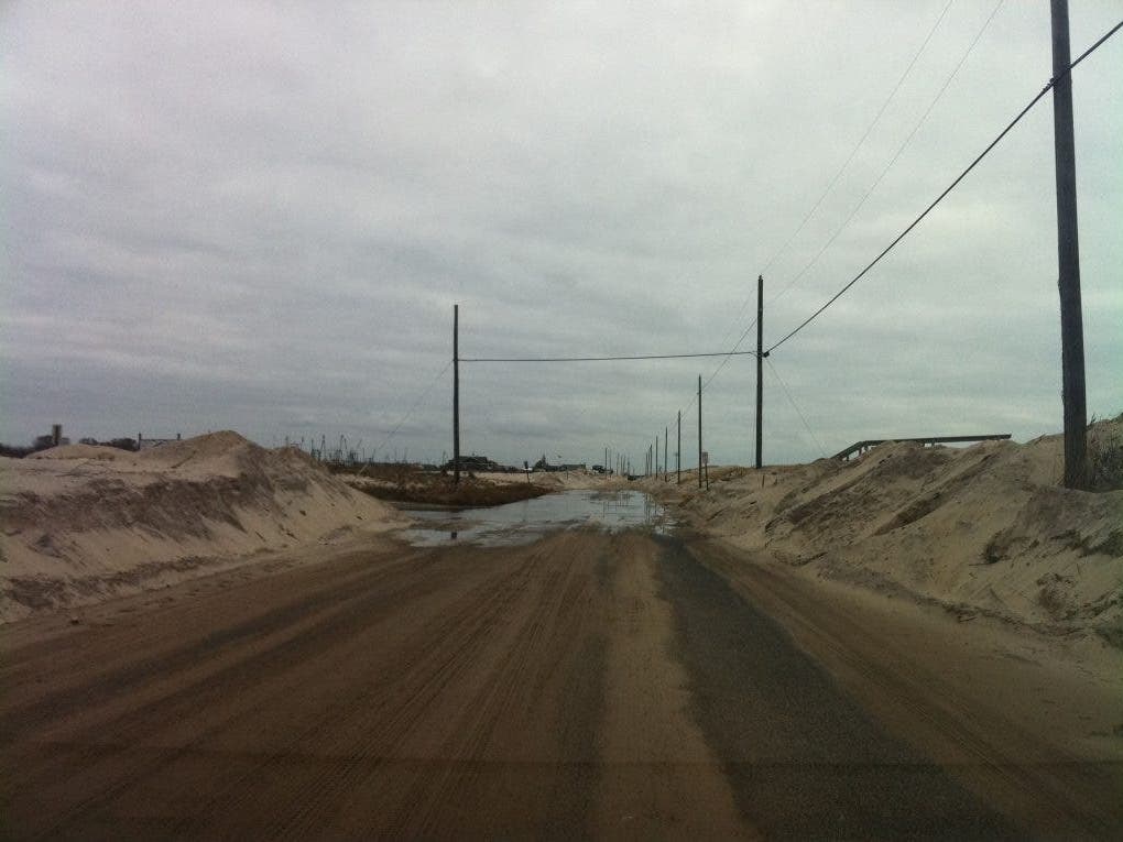 Hampton Bays is no stranger to storm-socked roads, especially after Sandy, which the photo above depict.