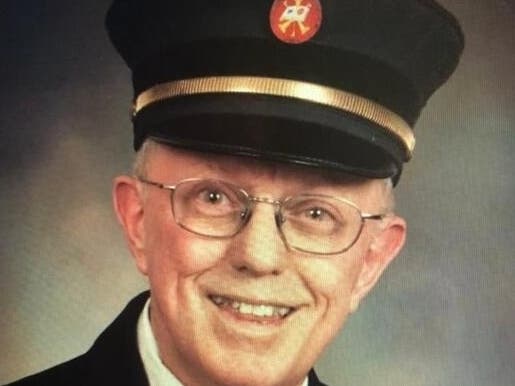 Thomas Mendenhall, in his wife Peggy's favorite photo of him. His face lit up with pride after being named chaplain of the East Quogue Fire Department, she said.