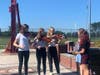 "Amazing Grace" was played by Girl Scouts Annie Antonucci, Evelyn Helinksi, and Macy Carter.