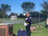 Cutchogue Fire Department Chief Amos Meringer rang the bell to mark 20 years.