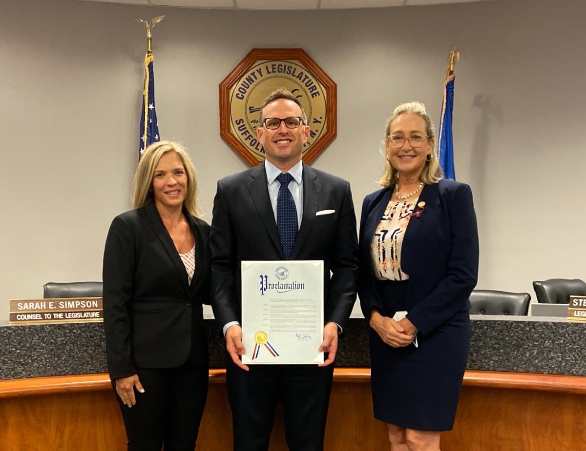 (From left to right) Dr. Korbin's wife, Seth Korbin, MD, and Legislator Bridget Fleming at the Suffolk County Legislature office in Riverside on Thursday, September 9.
