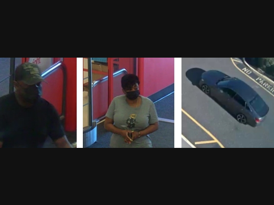The man and woman fled in a gray sedan, police said.