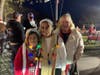 Kids came wearing Santa hats and glowing holiday necklaces.
