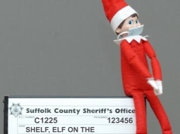 "“This poor elf has been framed."