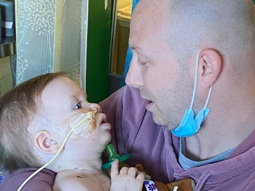 Everett Cotter shared a special moment with his father Brian after days in the hospital, where he waits for a life-saving heart transplant just 2 years after his older sister.