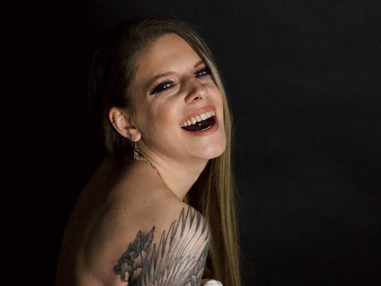 Katie Masterson is vying to be Ink magazine's cover girl and win a $25,000 grand prize. Her'es how to vote.