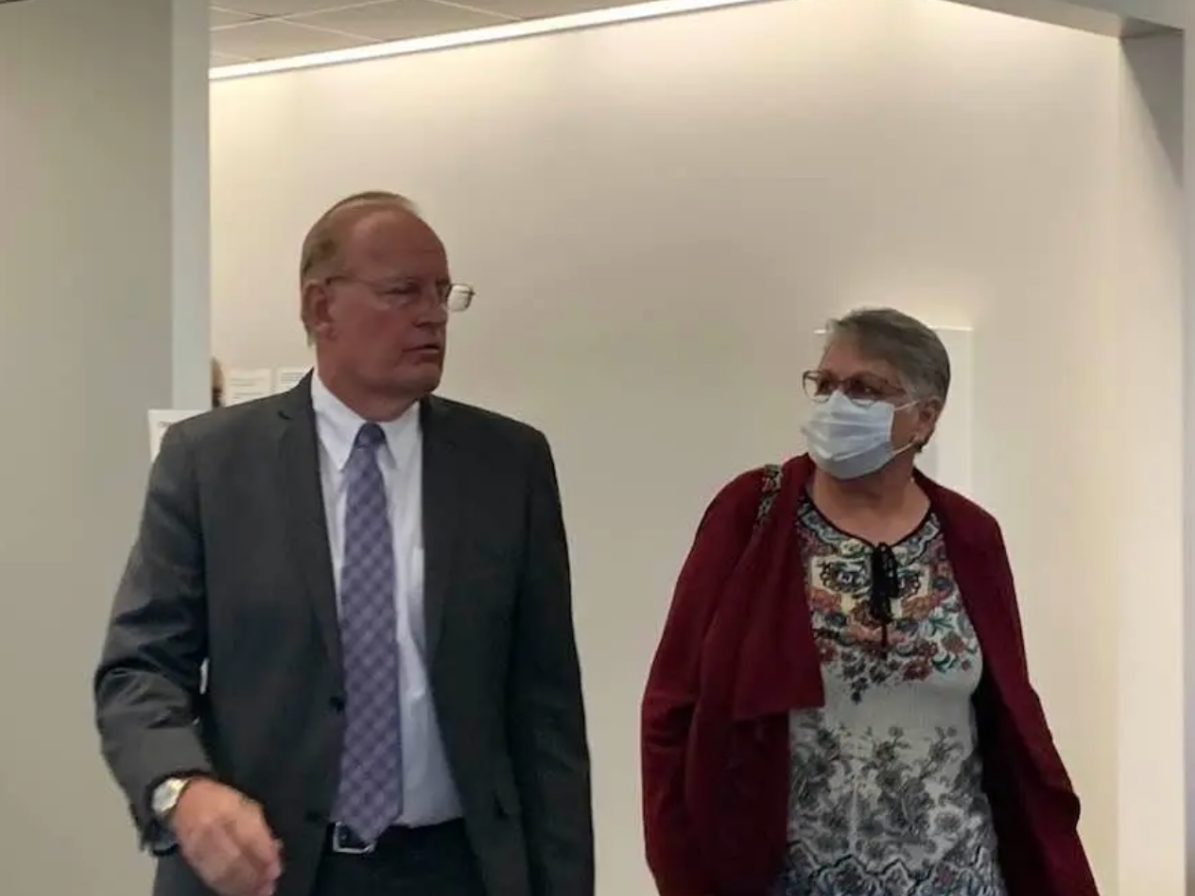 Diane Juergens, a bus driver charged with DWI, and Dennis Lemke, the Legal Aid Society attorney representing her, at a court appearance in August, 2021.