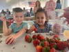 Kids were loving the strawberries Wednesday night.