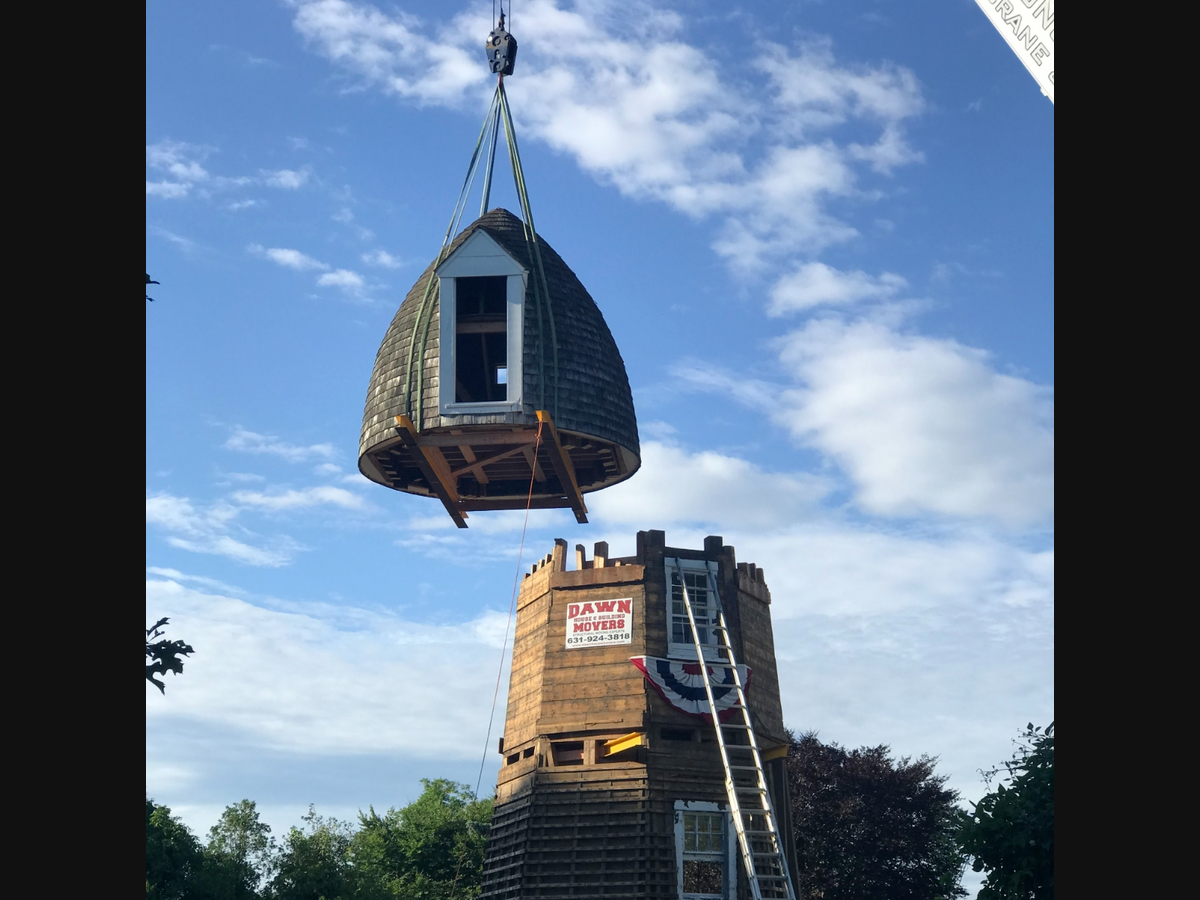 The windmill was dismantled and moved down Main Street.
