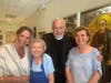 Father Alex Karloutsos, with his wife and other members of the church, welcomed guests to the festival, back after the pandemic.