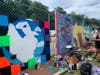 Graffiti artists created colorful works at the festival.